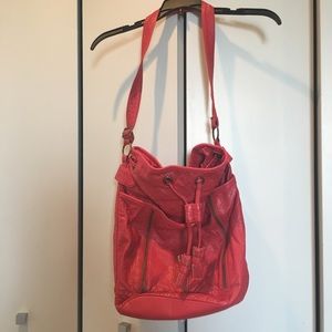 Red drawstring tote bag